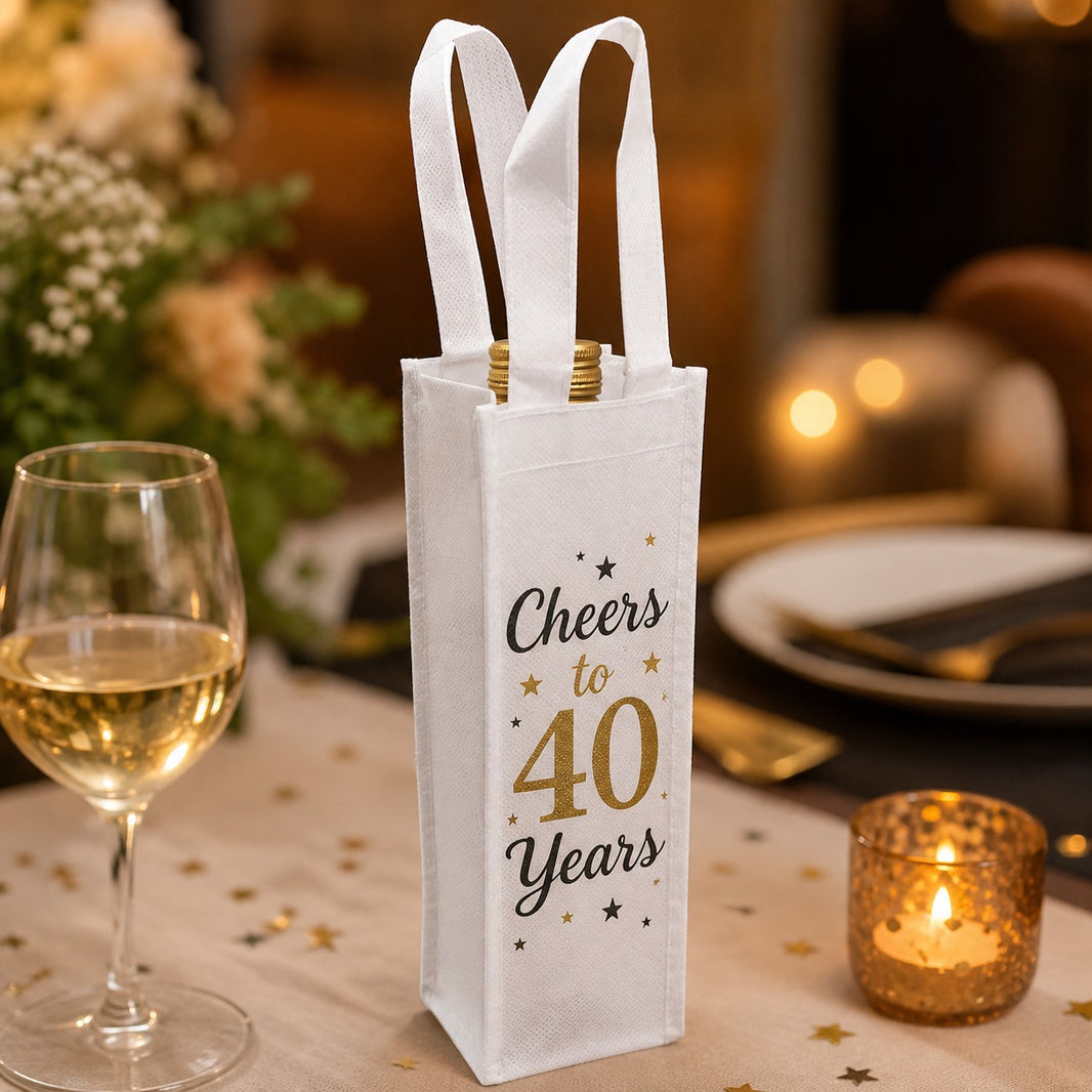 Mini wine bottle gift bag printed Cheers to 40 Years in gold for a 40th birthday party