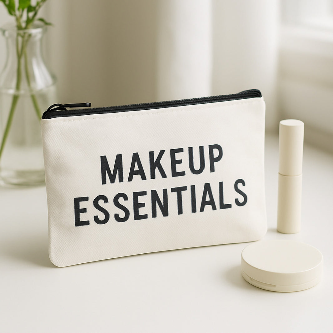 White personalised canvas makeup bag with Makeup Essentials print on a bright dressing table
