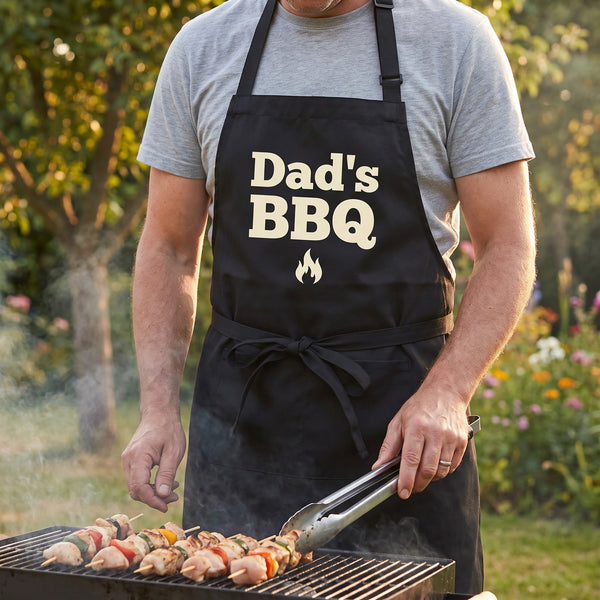 Custom apron for men — Dad's BBQ print worn at a garden barbecue, Father's Day gift