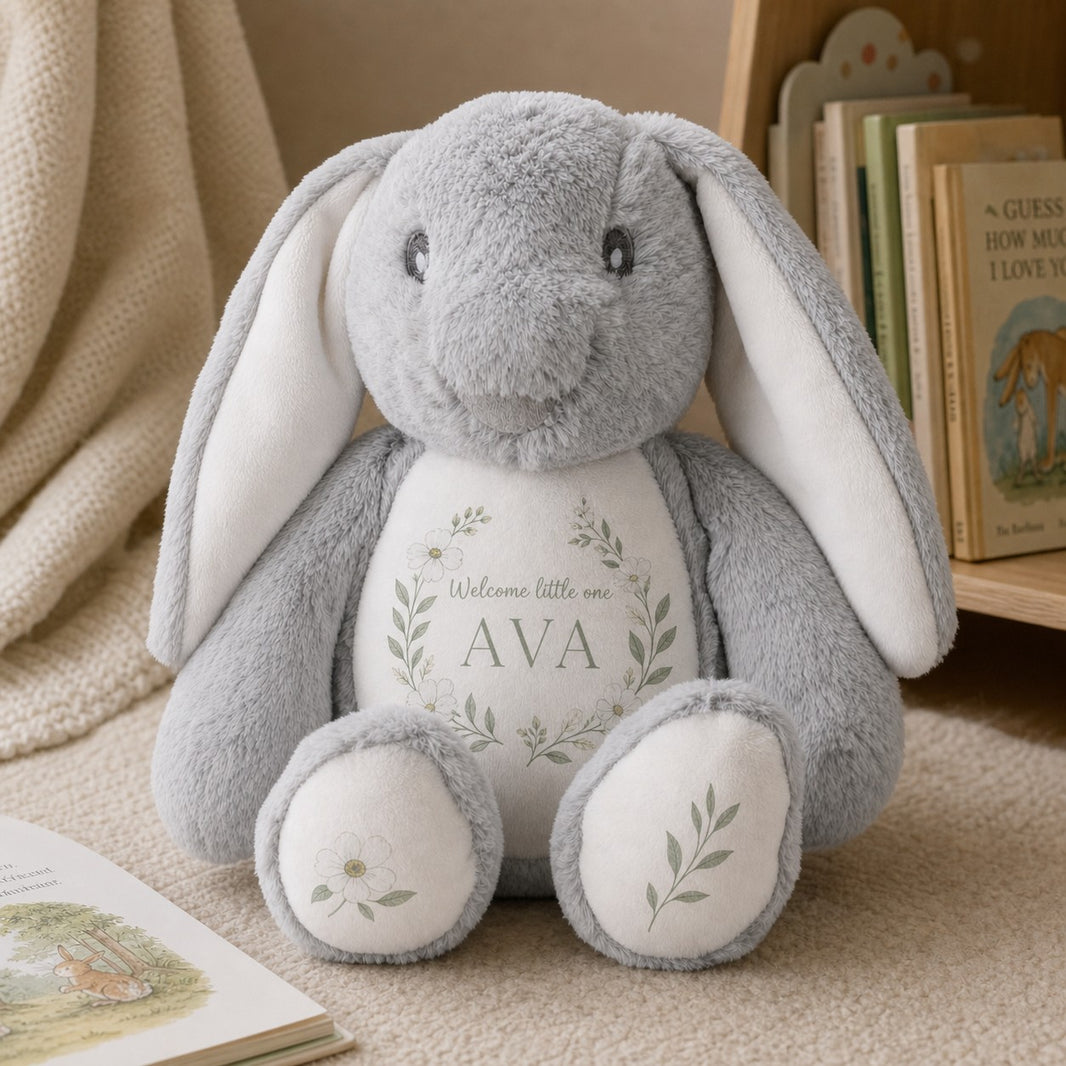 Personalised bunny soft toy printed Welcome Little One Ava with botanical wreath in a nursery