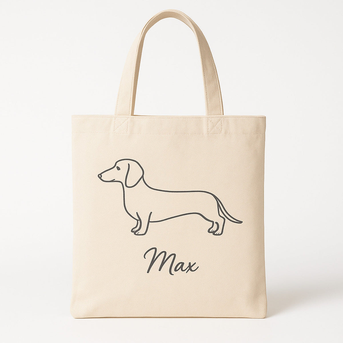 Personalised canvas tote bag with a line-art pet portrait and name