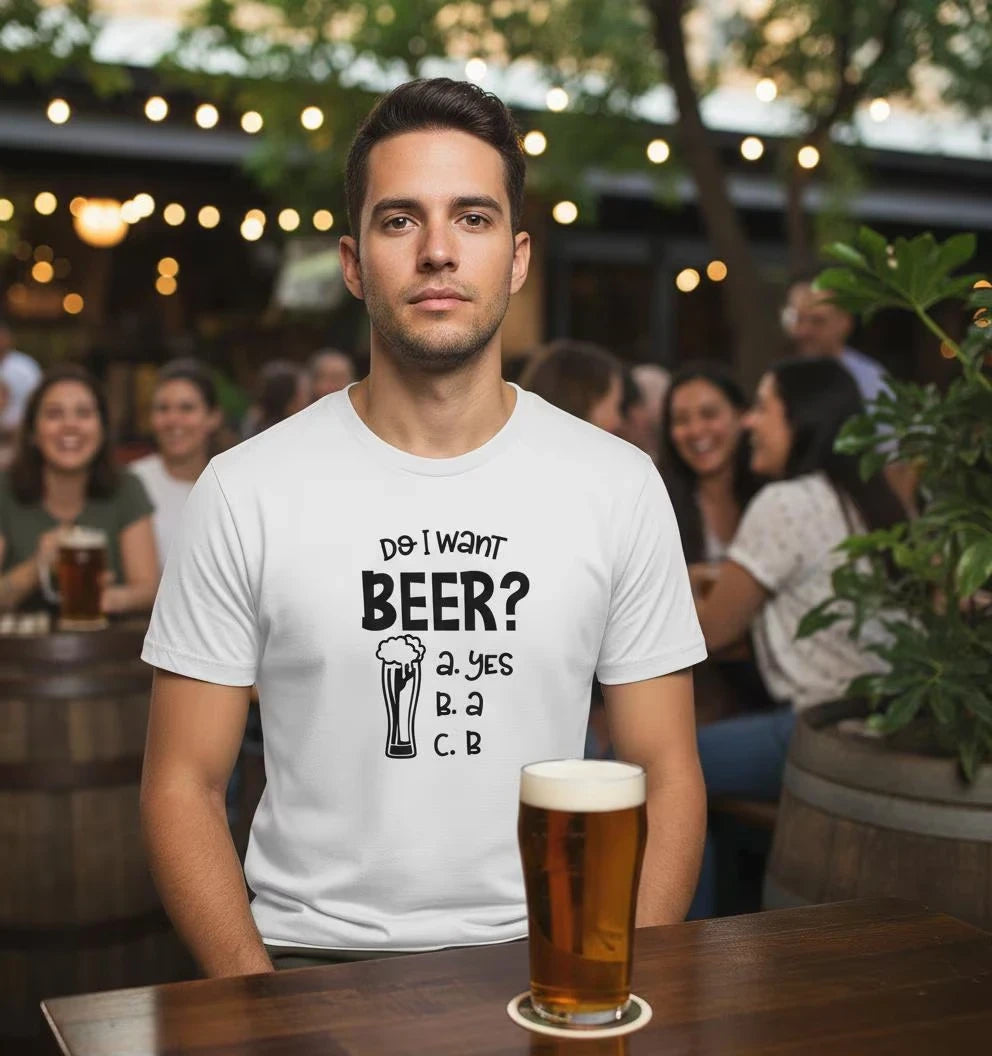 Man wearing a t-shirt with a beer-themed question in a pub setting