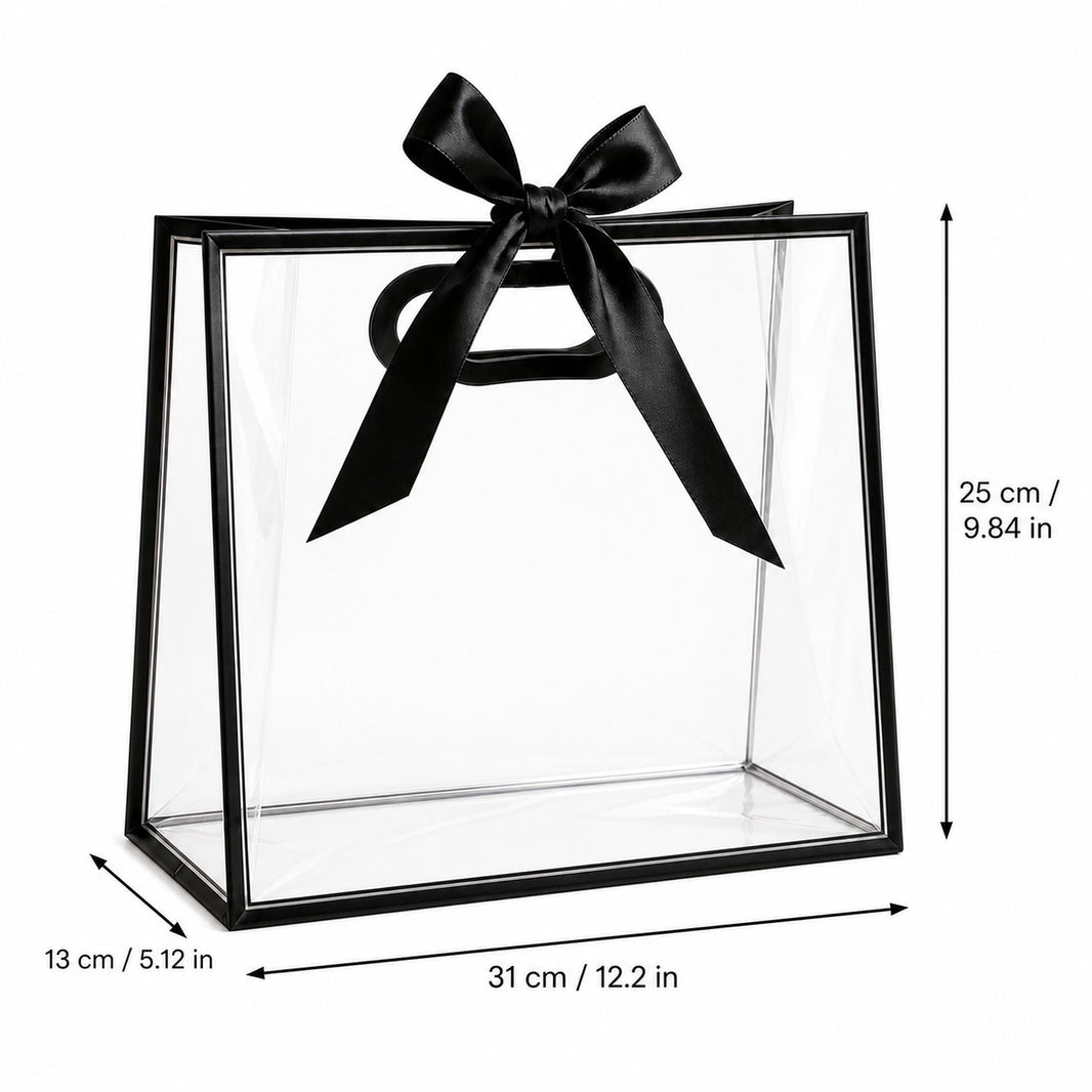 Size diagram of the clear presentation gift bag showing 31 cm wide, 25 cm high and 13 cm deep with a black satin ribbon