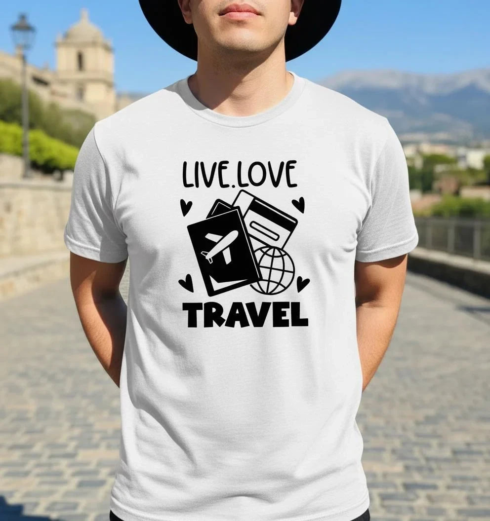 Person wearing a white t-shirt with 'Live Love Travel' design outdoors.