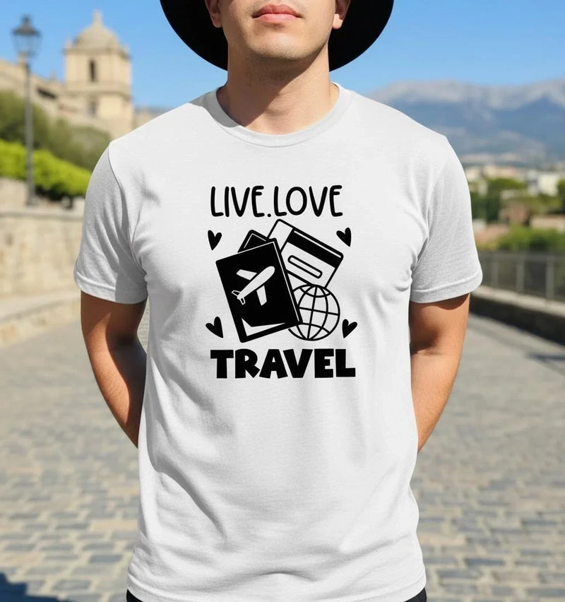 Person wearing a white t-shirt with 'Live Love Travel' design outdoors.