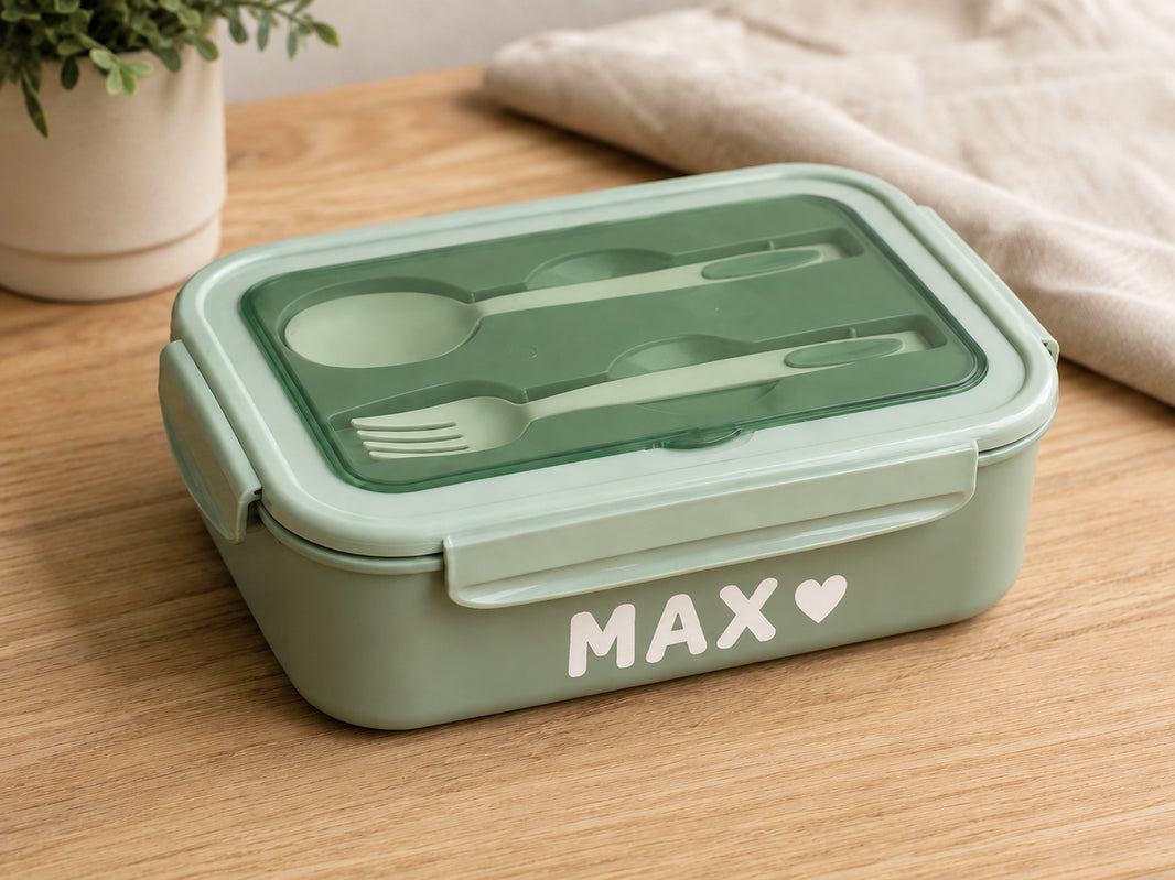 Personalised bento lunch box with the name Max and a heart, spoon and fork stored in the lid