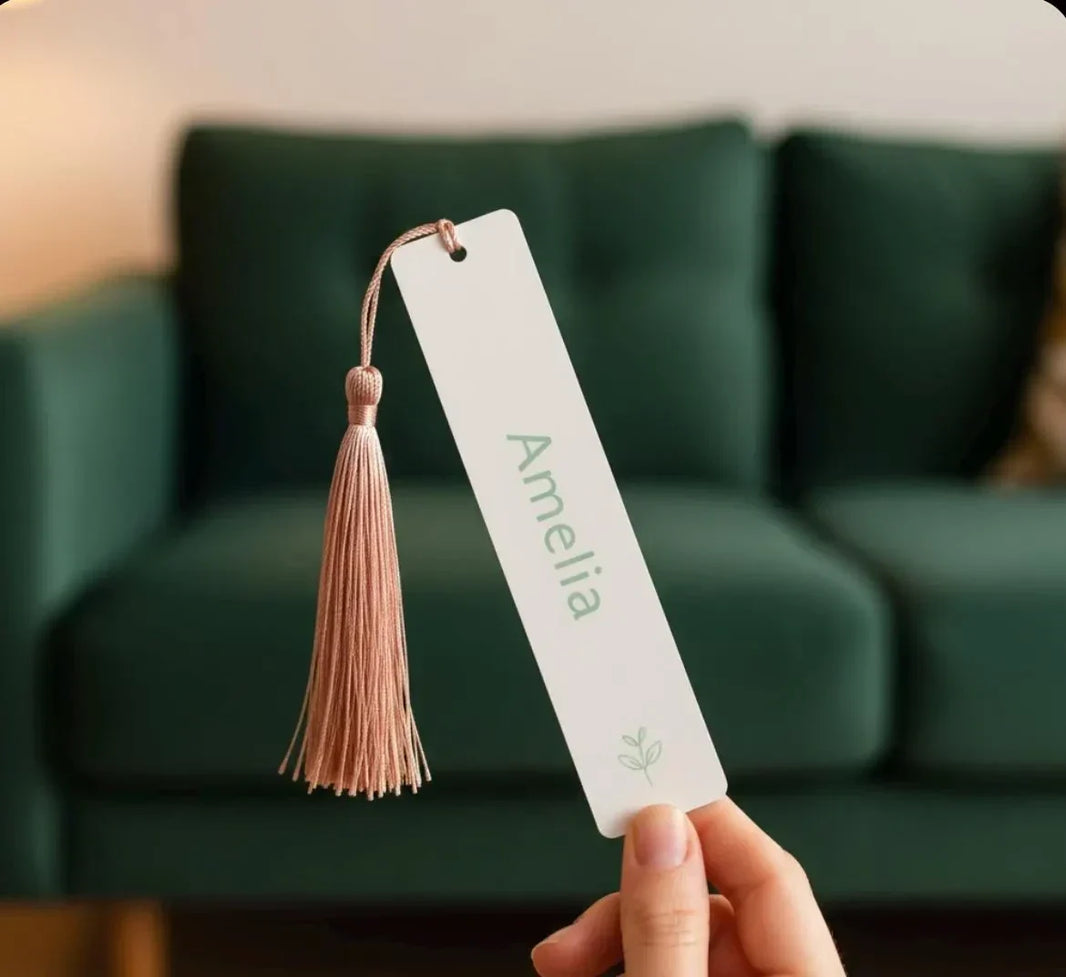 Close up of custom bookmark design with name and icon