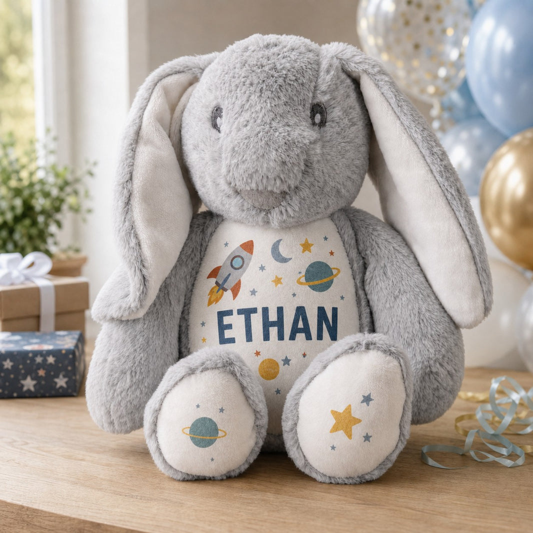 Personalised bunny teddy with space rocket and planets design and the name Ethan at a birthday party