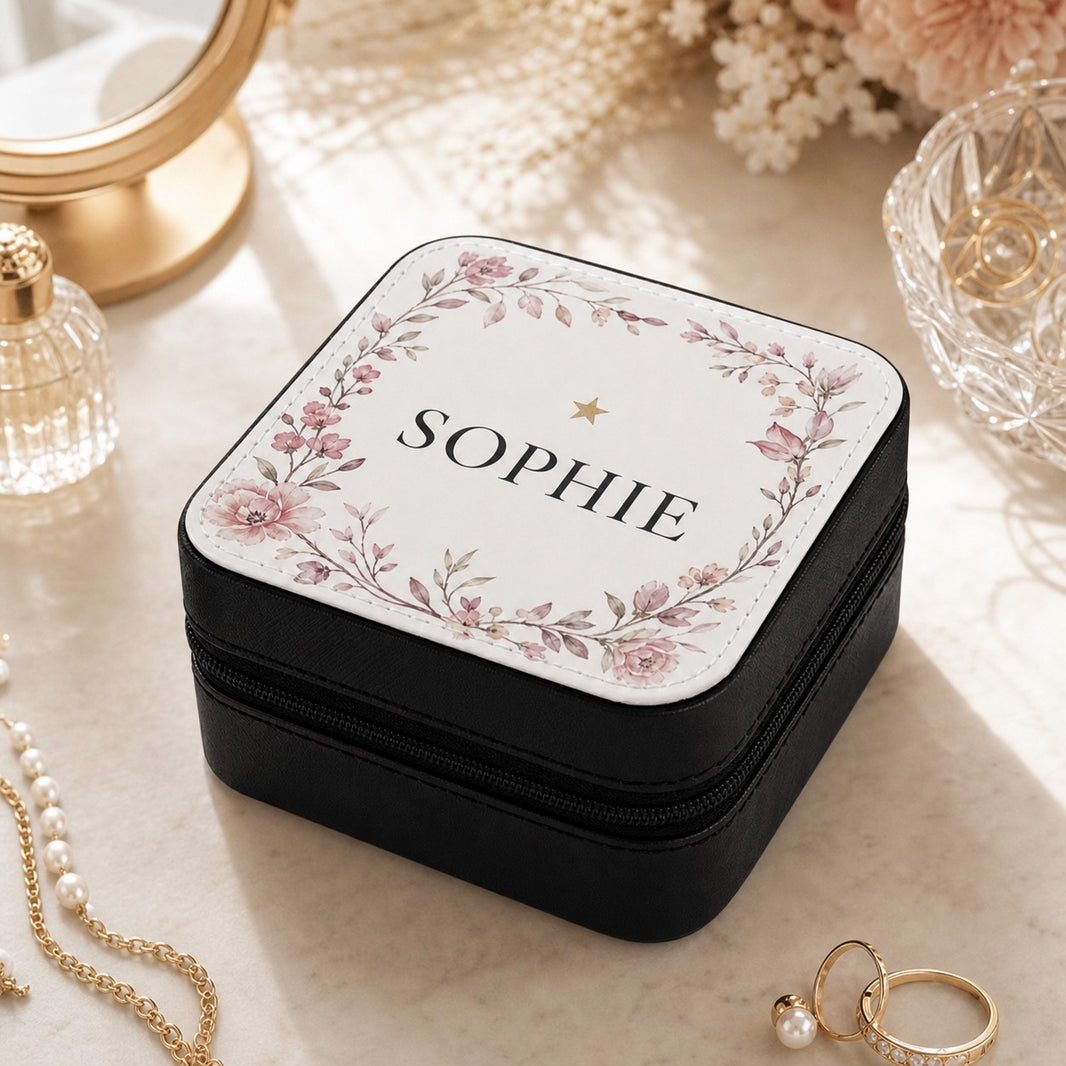 Personalised jewellery box with pink floral border and the name Sophie on a dressing table