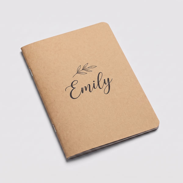 Personalised slim kraft notebook with a custom name printed on the cover