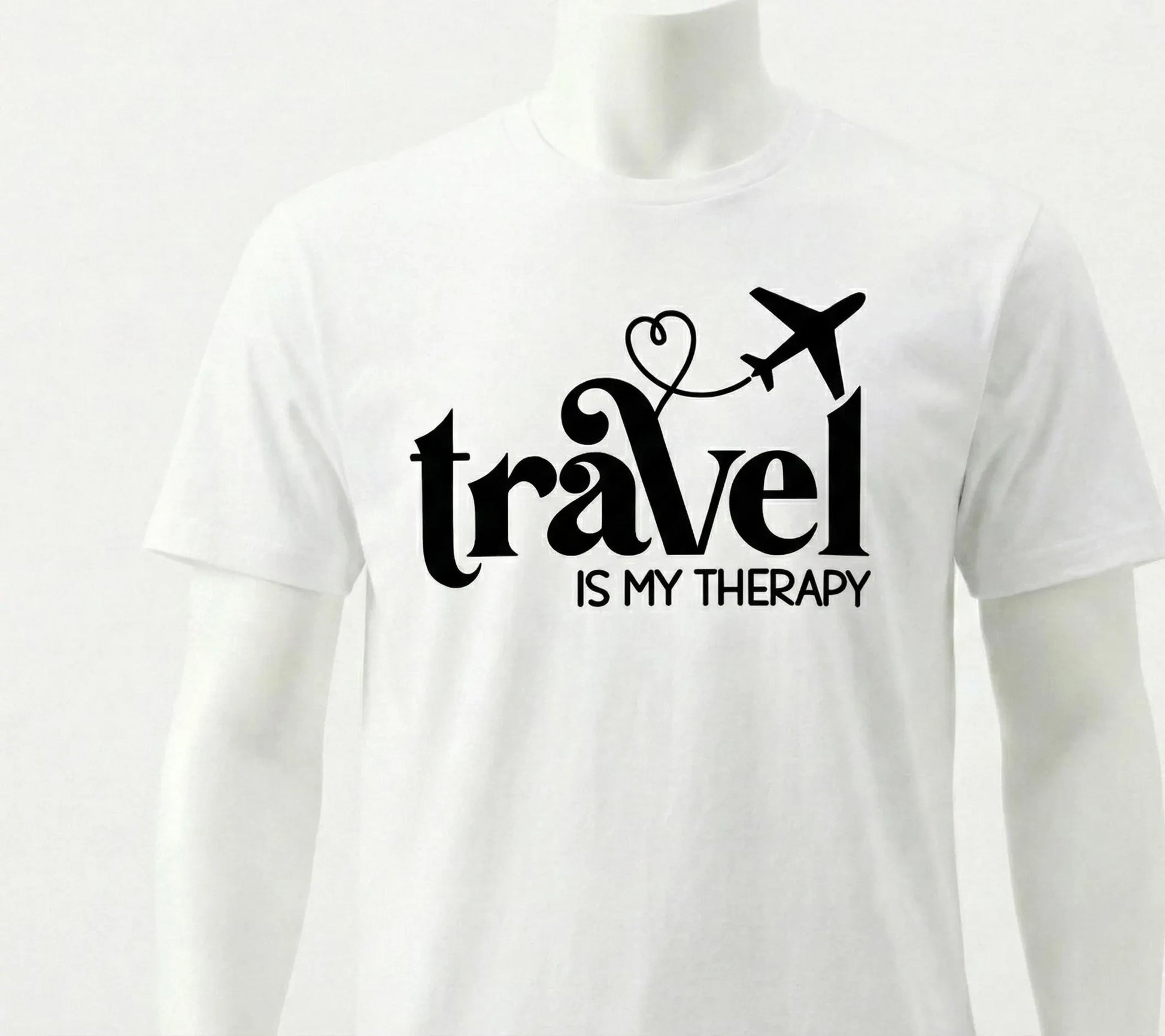 White t-shirt with 'Travel is my Therapy' text design on a white background