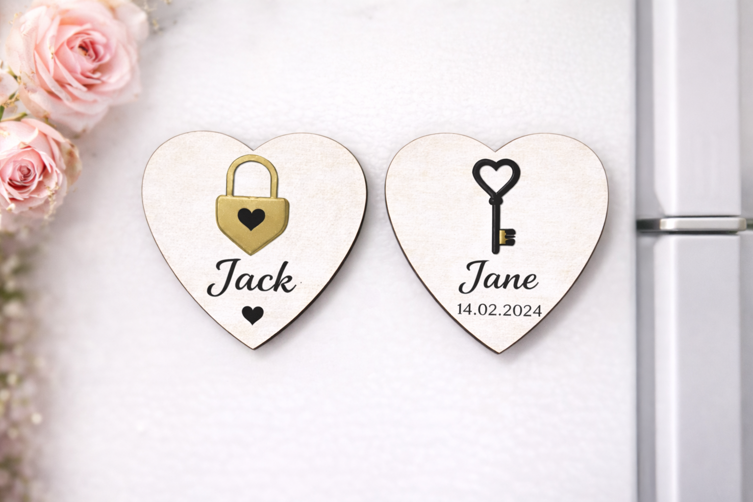 Two heart-shaped personalized magnets with names 'Jack' and 'Jane' on a white surface.